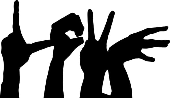 Silhouetted Hands Forming Letters image in article Communicating with Parents by Writing the Perfect Newsletter