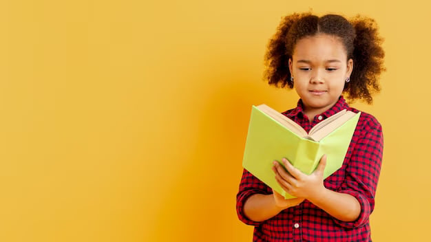 Young Girl Engrossed in Reading