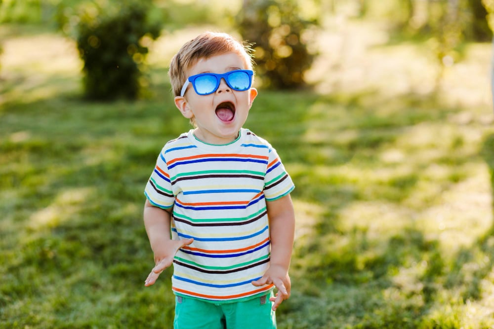 Joyful Child in Sunglasses