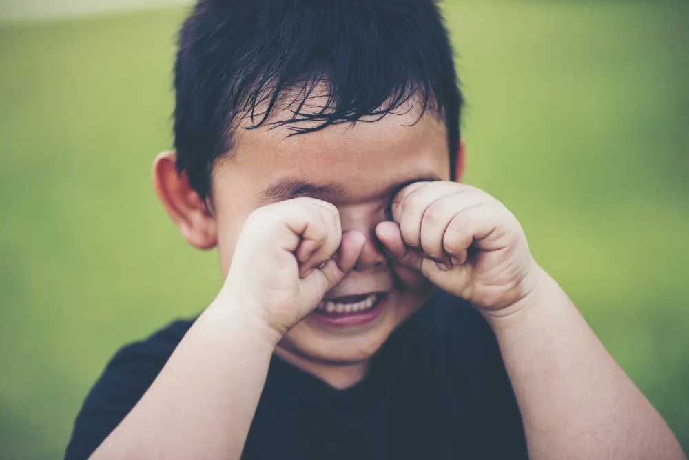 Young Boy Expressing Emotion