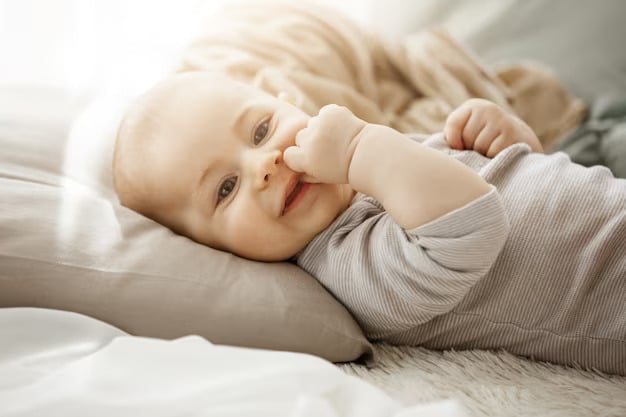 Joyful Baby Smiling on Soft Pillow