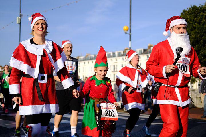 Cheerful Participants in Christmas Attire